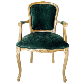 Vintage velvet emerald green arm chair with gold accents in a lounge set with a vintage white and gold sofa and a gold vintage coffee table. 