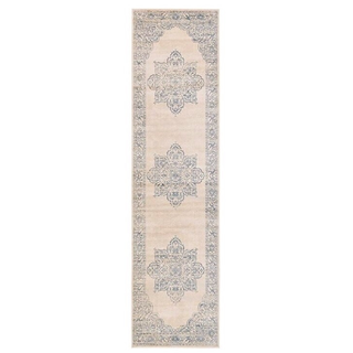 vintage Ivory beige rectangular runner rug down an aisle surrounded by flowers and leding towards an altar as people sit on each side of the runner on chairs indoors facing the altar. 