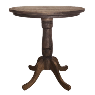 Farmhouse dark wood round high cocktail table with floral vase on it outdoors. 