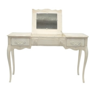 Vintage ivory beige rectangular dresser accent table with mirror is outside on grass and in front of a wooden fence with trees lining it. On the table there is a felt sign with writing and a clear and gold box. Next to the sign are sticks with cutouts. Ha