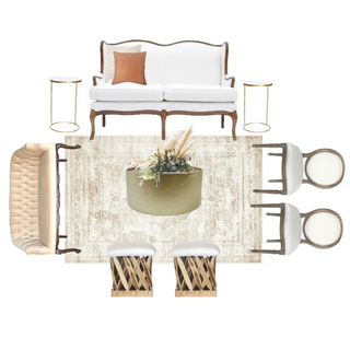 ivory beige loveseat with a gold round coffee table with vintage wood chairs on one side of the coffee table on a beige pattern rug and side tables and a vintage beige loveseat on the other side with ottoman boho stye on the edge. 