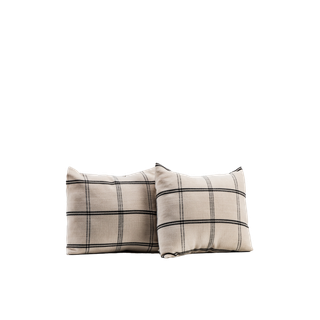 two neutral square plaid pillows 