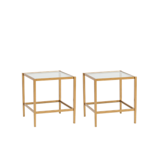 square gold end table with a glass top as event rental