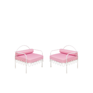 pair of eclectic curved white metal armchair rentals with pink cushions