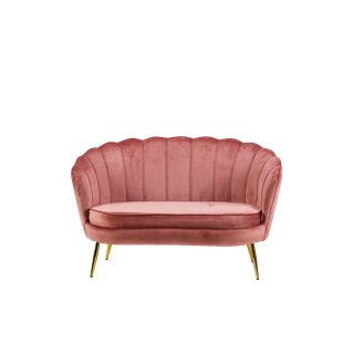 pink velvet settee with a scalloped back and gold legs