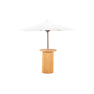 light wood textured cocktail table with round top and white umbrella 
