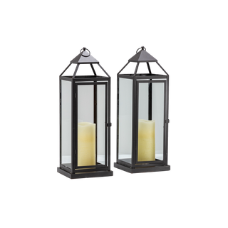 pair of large metal and glass lanterns with LEFD candles inside