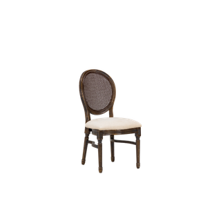 wooden chair with cane back and neutral upholstered seat 