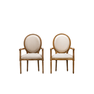 pair of neutral linen side chairs with wood trim