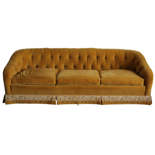 Gold velvet sofa with tufted detailing and smooth lines for rent from Relics Rentals in Milwaukee
