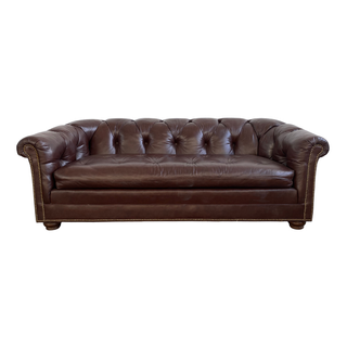 Brown tufted leather chesterfield sofa for wedding or event rentals