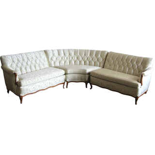 Cream sectional availble for wedding and event rentals from Relics Rentals in Milwaukee, WI
