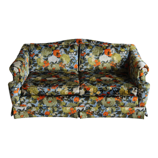 Floral loveseat with green orange and blue tones available to rent from Relics Rentals based in Milwaukee