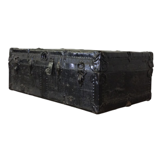 Black coffee table trunk available from Relics Rentals based in Milwaukee, WI