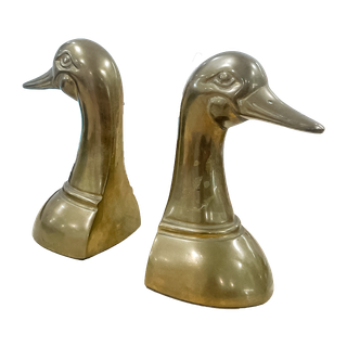 Pair of bookends with duck head in gilded brass. H : 22…