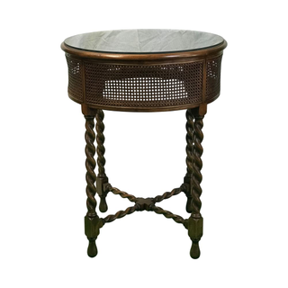 vintage accent table with  rattan sides and top with twisted legs 