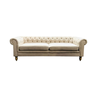 modern chesterfield style sofa in neutral linen style fabric