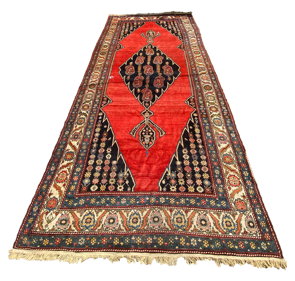 Red, black and beige persian rug