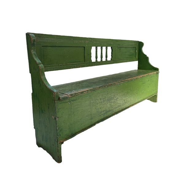 A three quarter view of a green antique wooden bench for hire