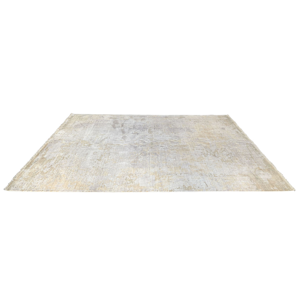 Neutral gold tone rug