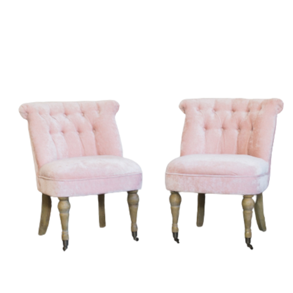 two light pink chairs 
