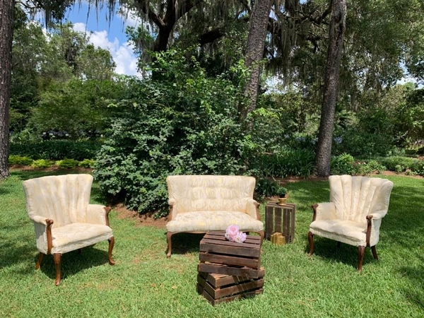 Ivory and gold chairs with wood arm rest and bottoms