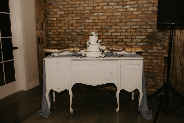 Antique white buffet with gold accents
