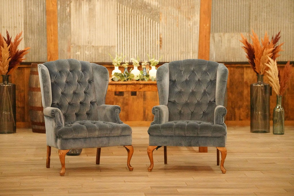 Blue tuffed velvet high back chairs