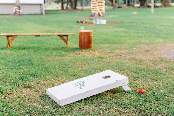 White painted cornhole boards comes with 2 sets of bags 