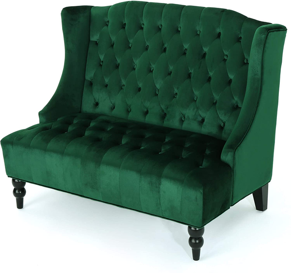 Emerald green tuffed velvet with black wood legs