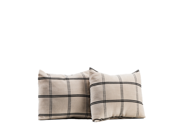 two neutral square plaid pillows 
