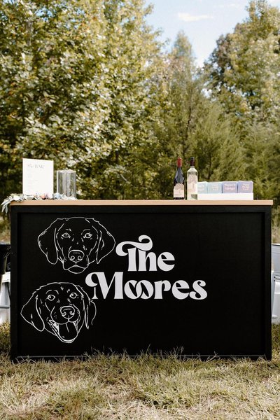 black bar rental with light wood top and vinyl facade customization