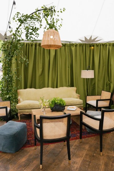 event lounge decorated with red boho rug rental