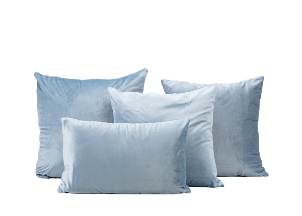 four light blue velvet pillows 