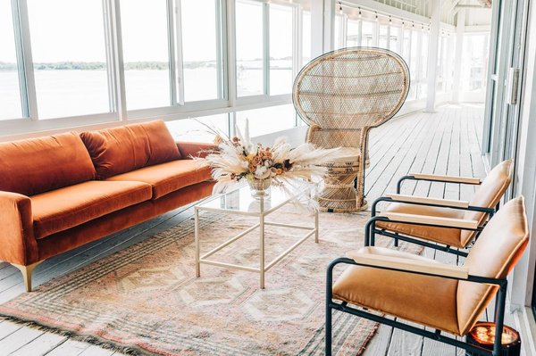 event lounge seating with pink and neutral bohemian patterned rug 