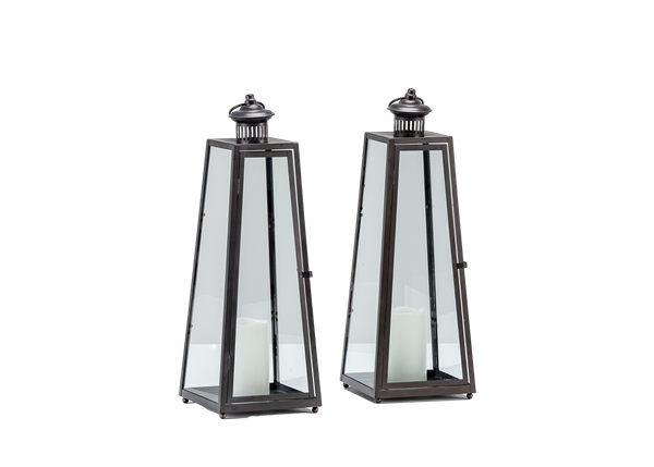 pair of angled black metal and glass lanterns with LED candles inside