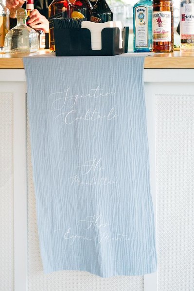 light wood shadowbox bar rental with white cane insert and light wood bar top 