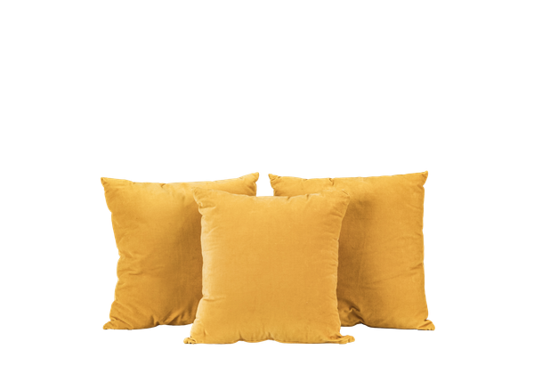 three canary yellow square pillows