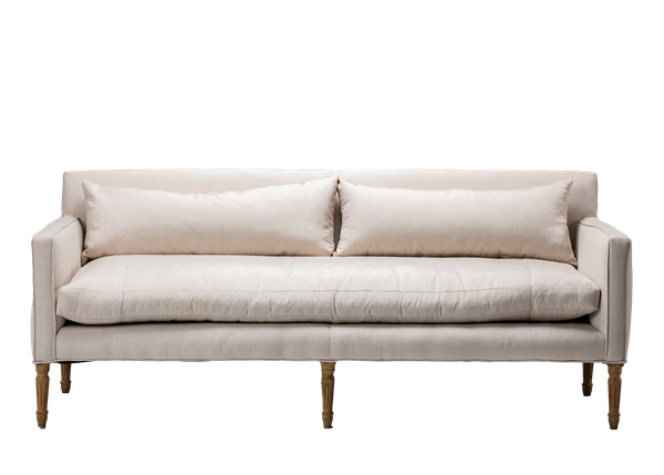 neutral linen sofa with wood legs