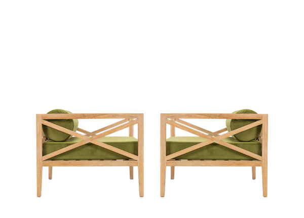 side view of pair of contemporary light wood armchair rentals with green velvet cushions