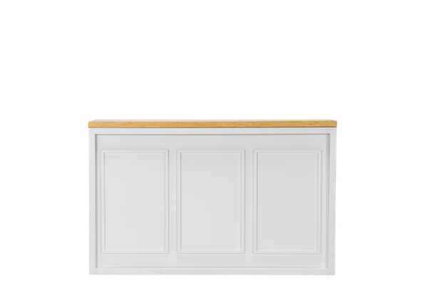 white shadowbox bar with a white customizable insert featuring stately crown molding and a light wood bar top