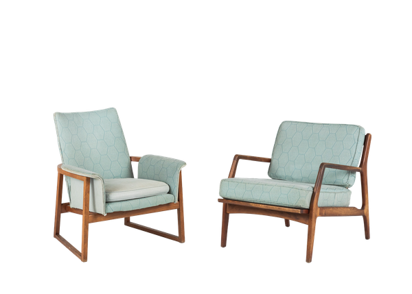 pair of light blue modern chairs with wooden frames