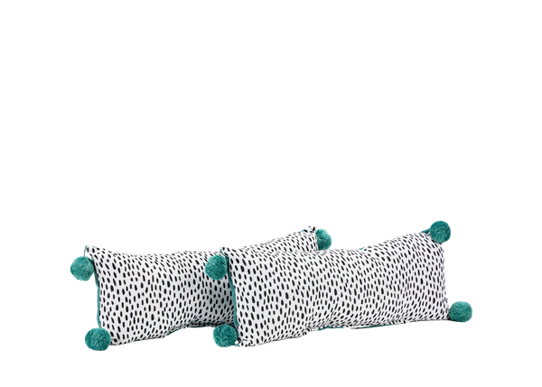 two teal blue patterned lumbar pillows