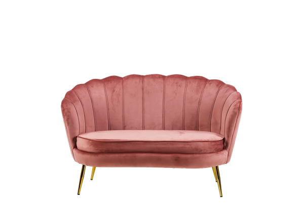 pink velvet settee with a scalloped back and gold legs