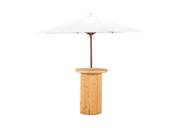 light wood textured cocktail table with round tabletop and white umbrella