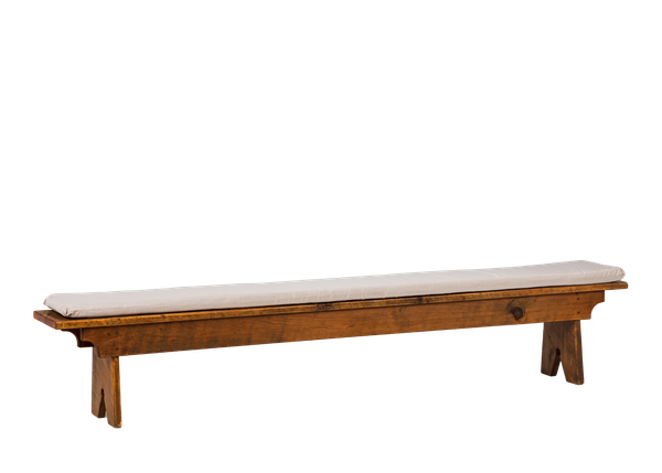 solid pine bench stained dark brown with a gray bench cushion 