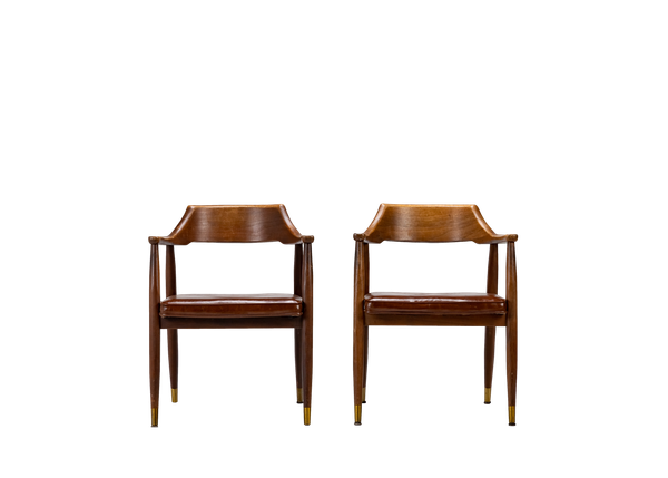 pair of wooden mid-century modern chairs with leather upholstered seat