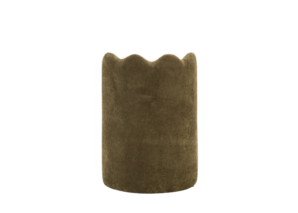 back view of upholstered green chair with scalloped back