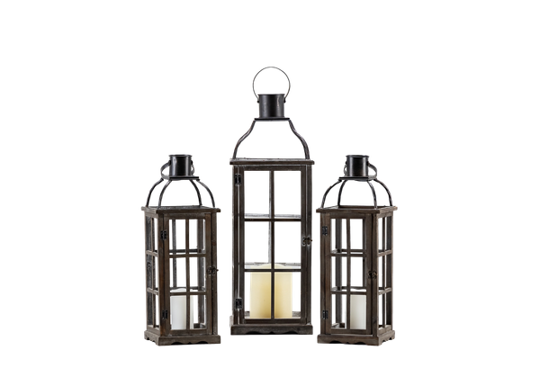 trio of wooden and metal lanters with LRED candles inside