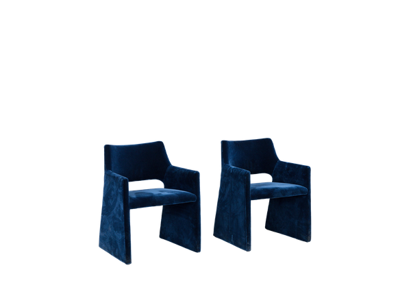 pair of deep blue velvet chairs